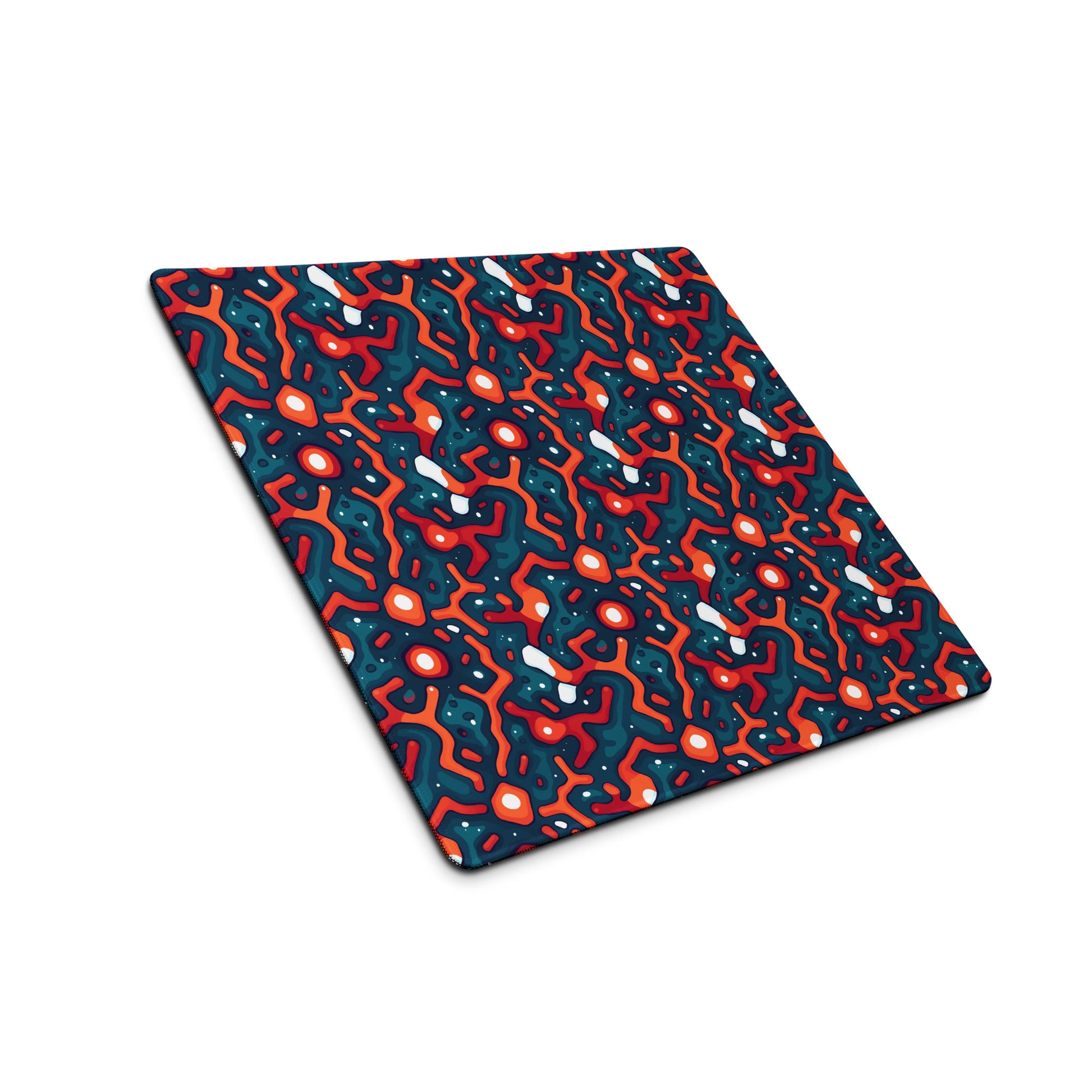 A 18" x 16" desk pad with a blue and orange crack pattern sitting at an angle.
