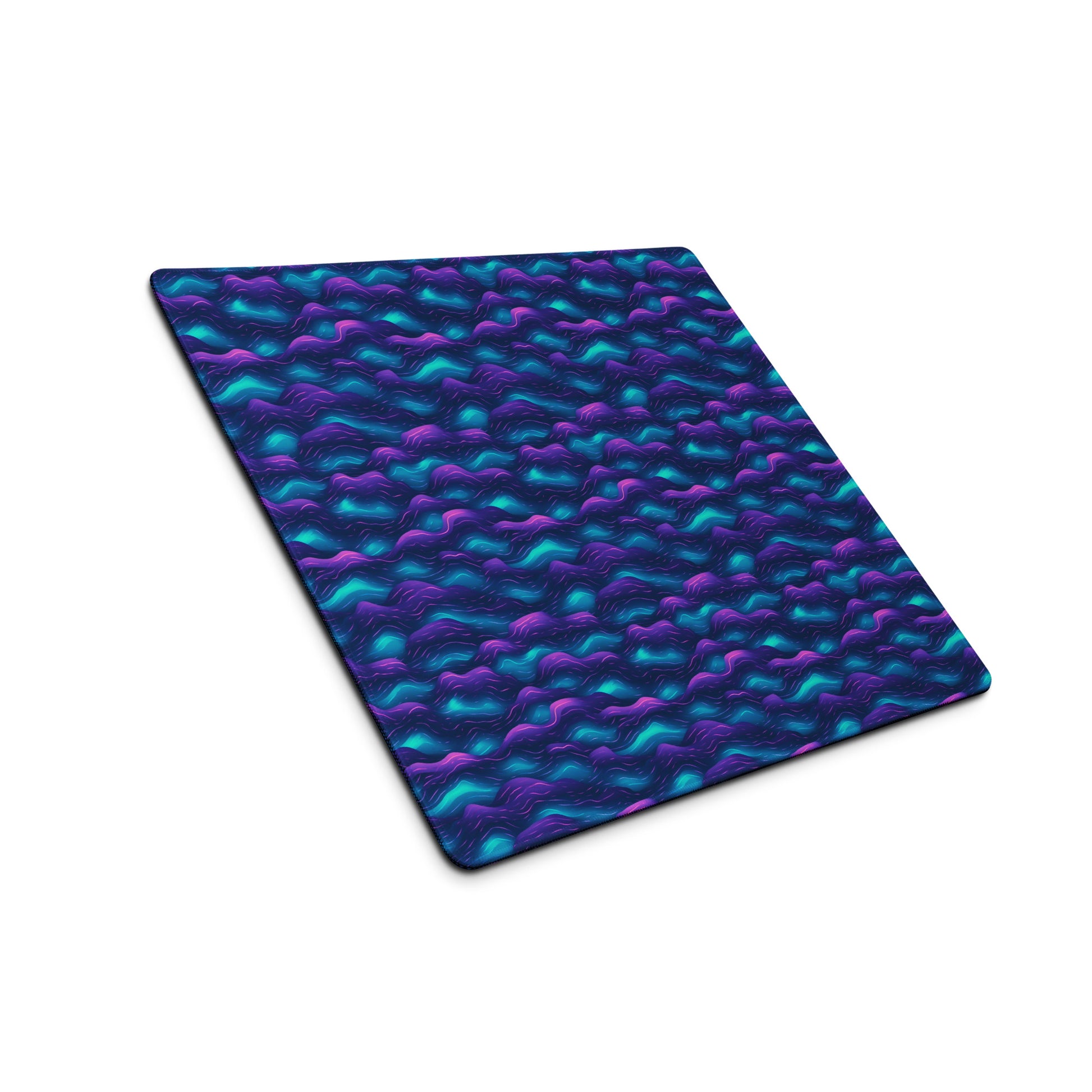A 18" x 16" desk pad with blue and purple wave pattern sitting at ana angle.