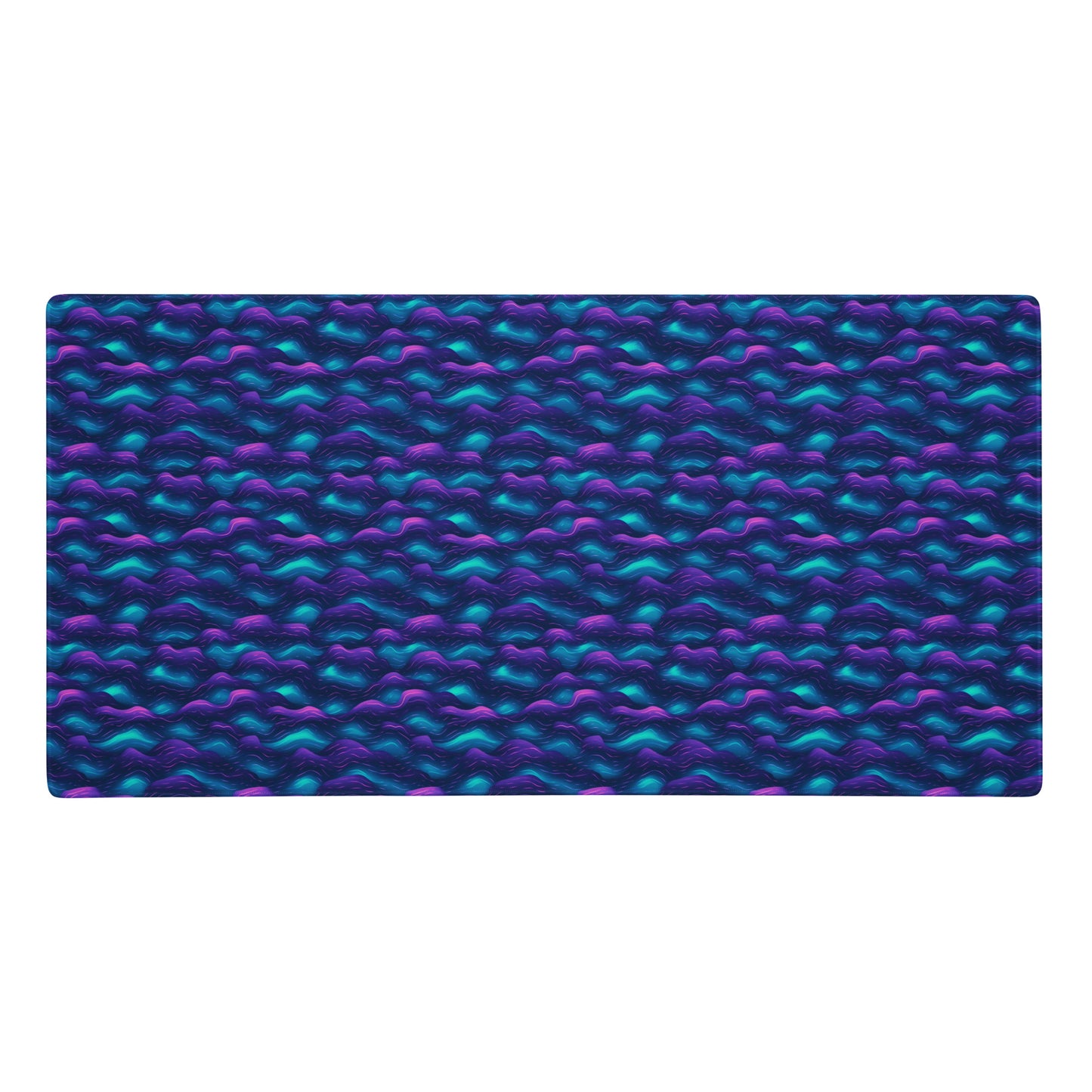 A 36" x 18" desk pad with blue and purple wave pattern.