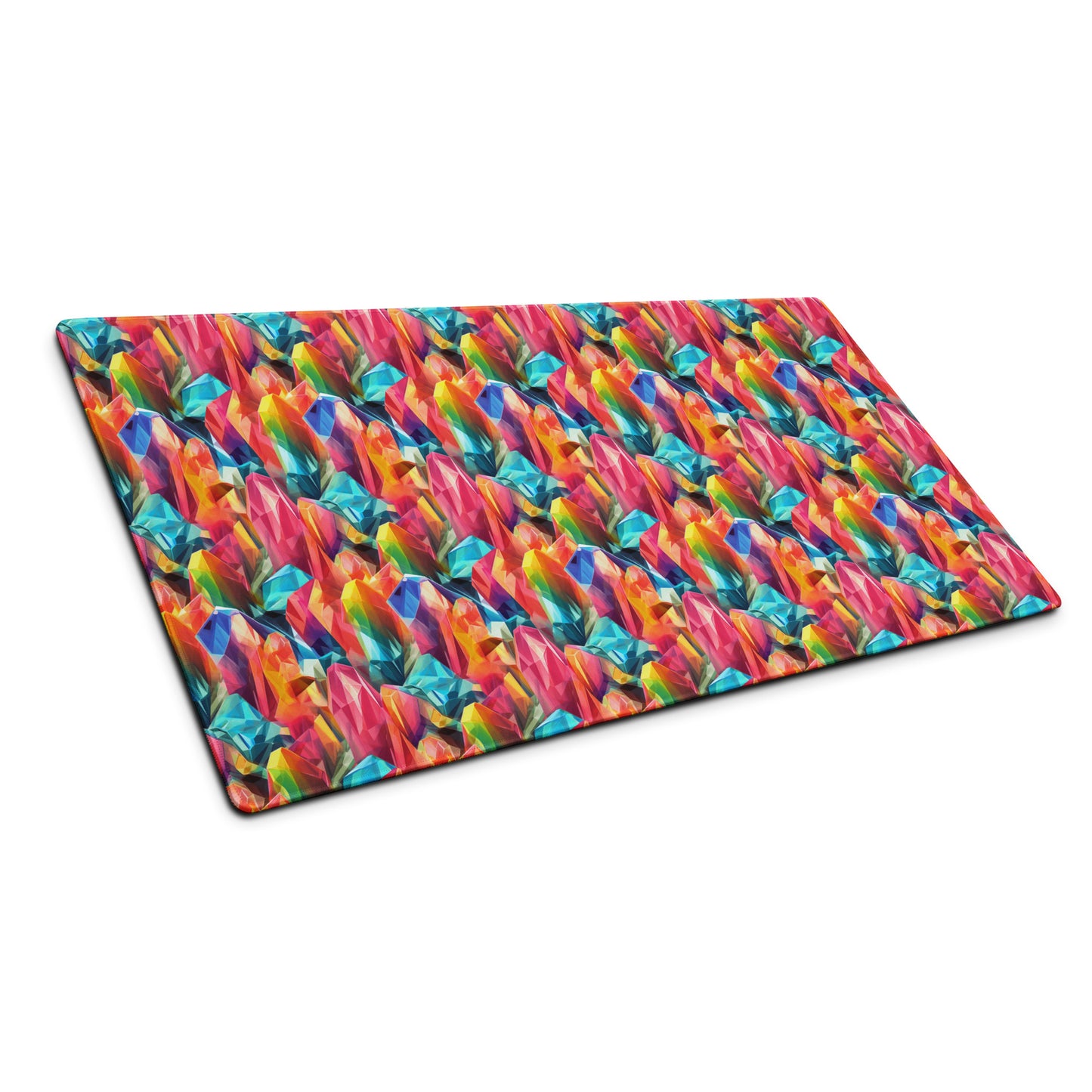 A 36" x 18" gaming desk pad with rainbow crystals sitting at an angle.