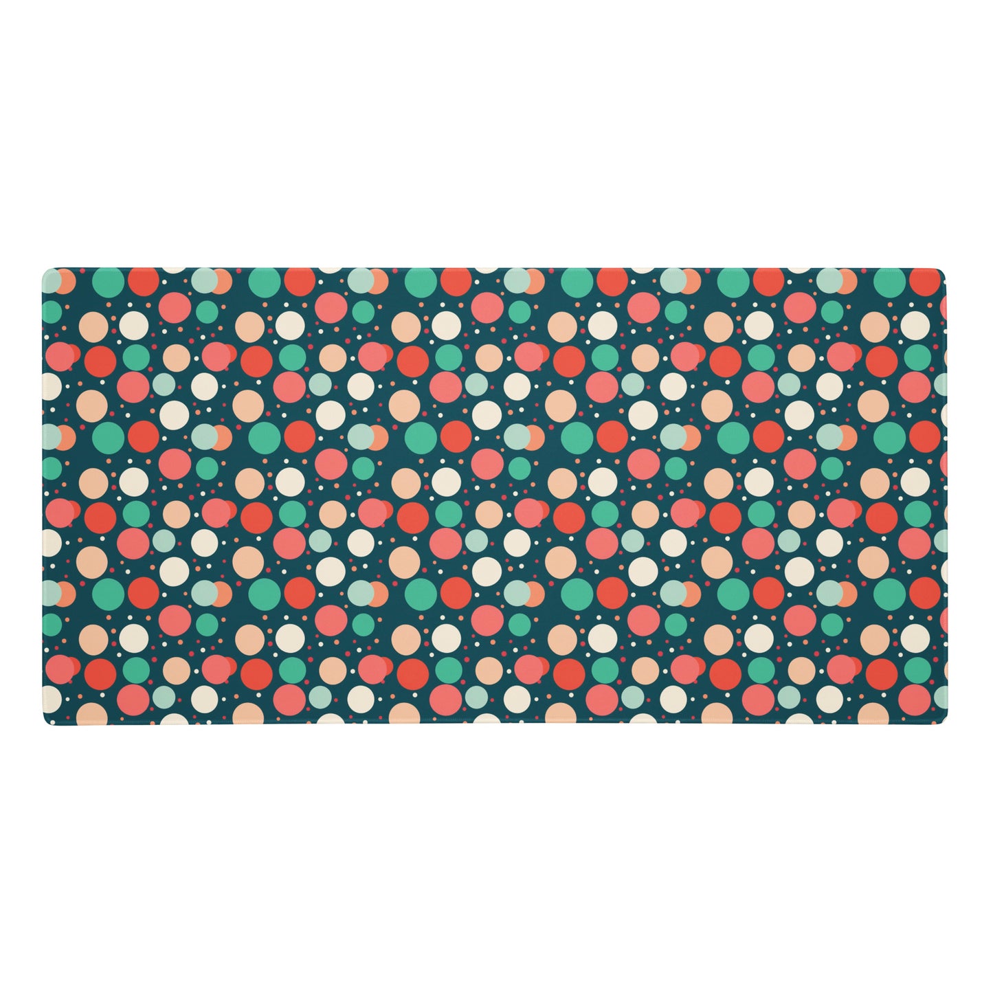  A 36" x 18" desk pad with red teal and yellow polka dot pattern.