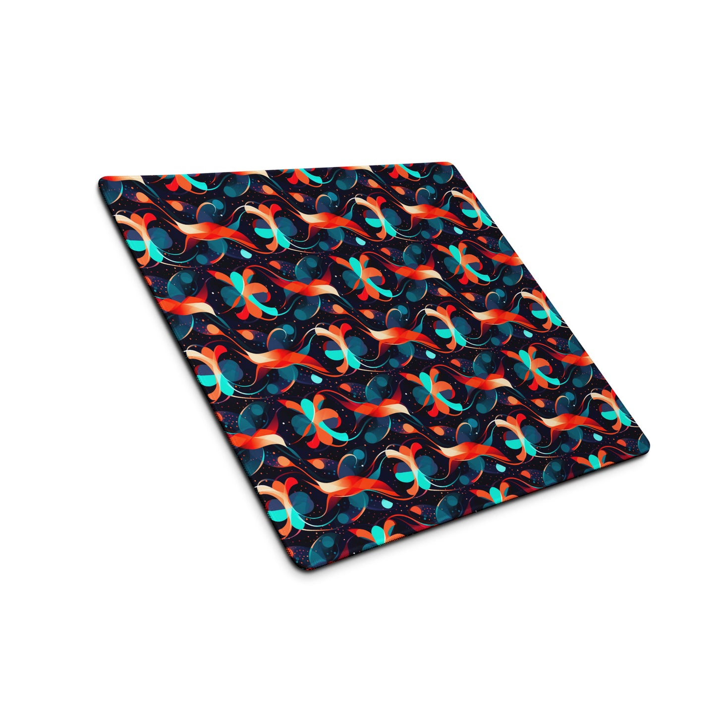 A 18" x 16" desk pad with a wavy orange and blue pattern sitting at an angle.