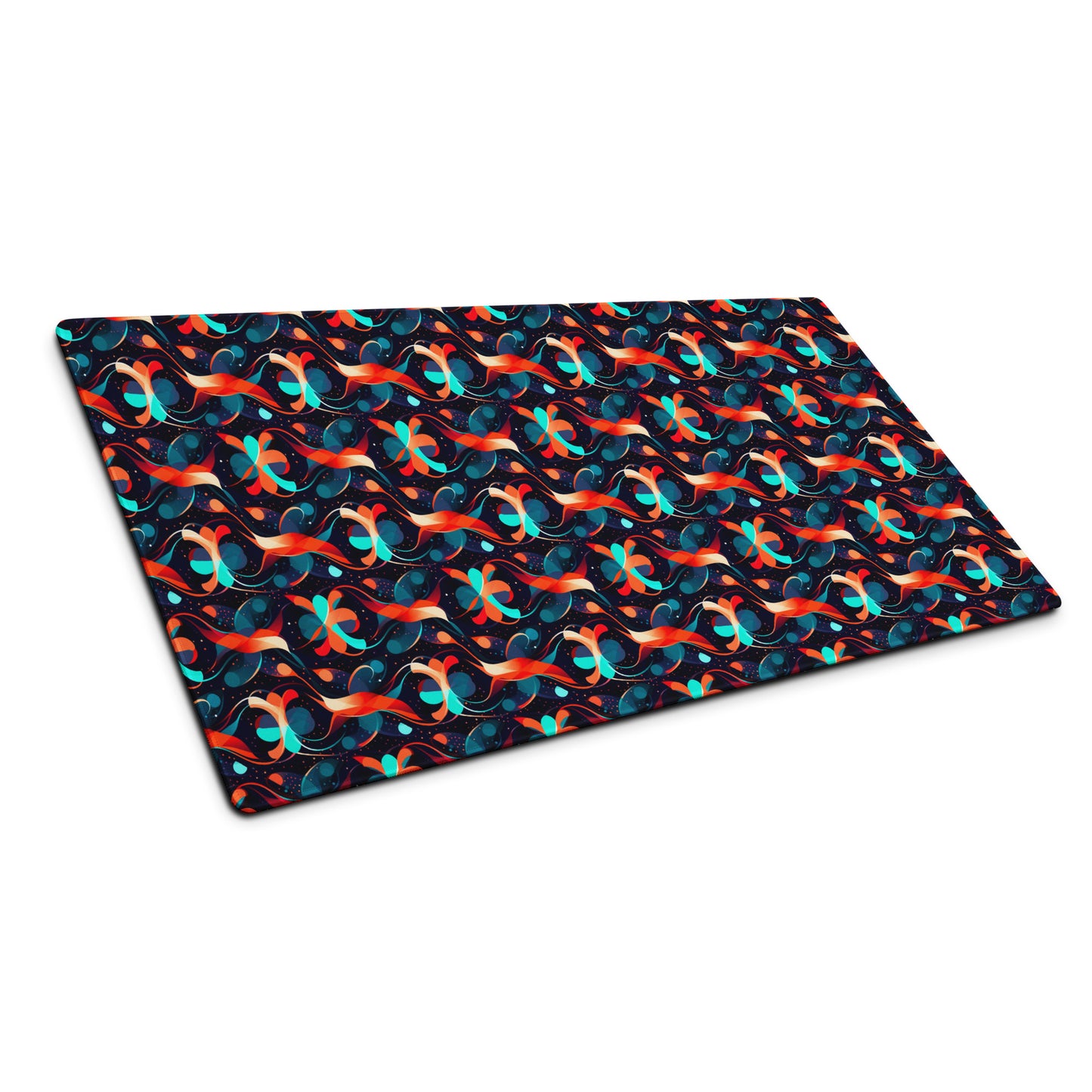 A 36" x 18" desk pad with a wavy orange and blue pattern sitting at an angle.