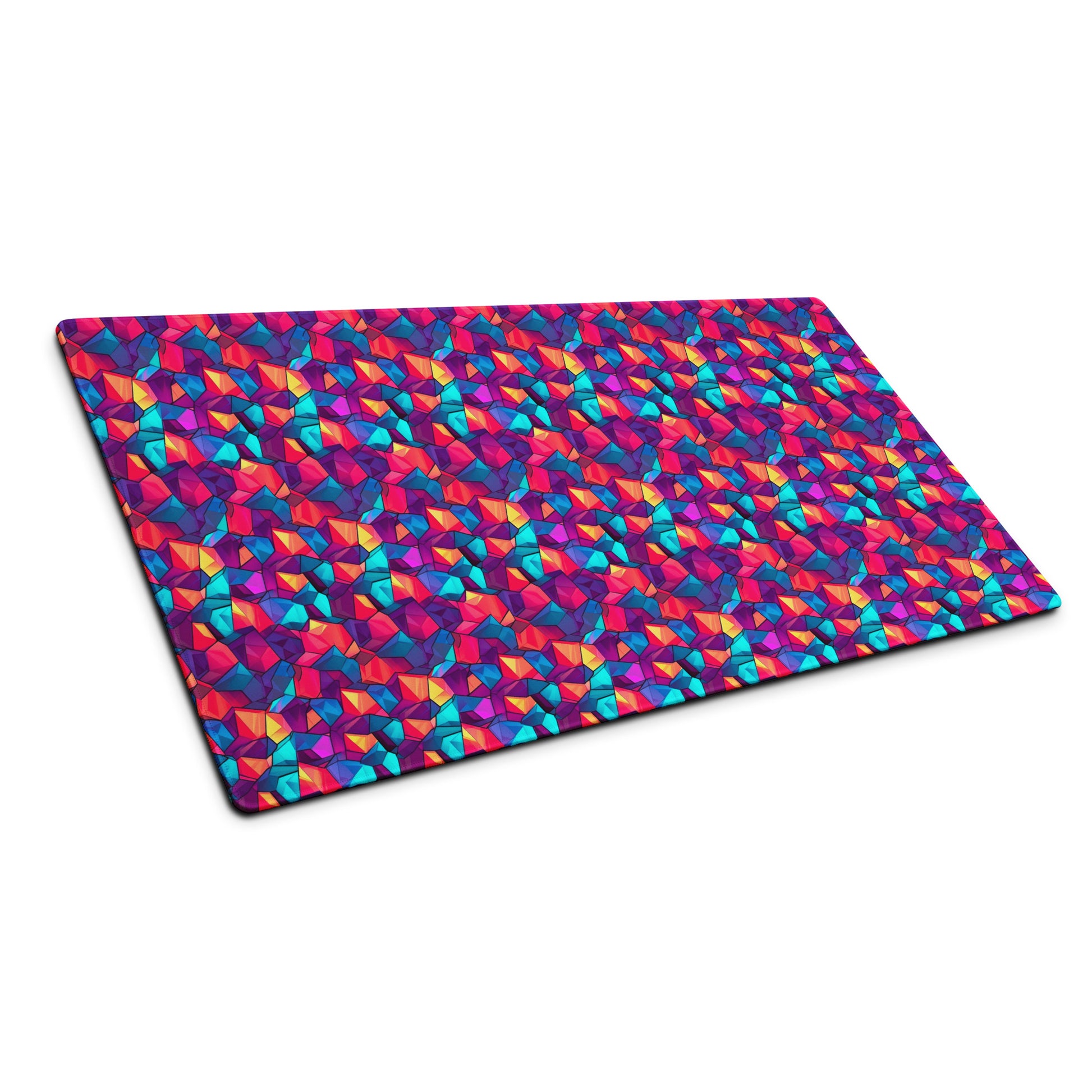 A 36" x 18" gaming desk pad with red, blue, and purple crystals sitting at an angle.
