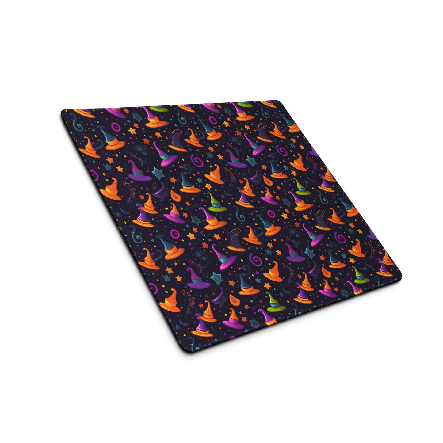 A 18" x 16" desk pad with a orange and purple wizard hat pattern sitting at an angle.