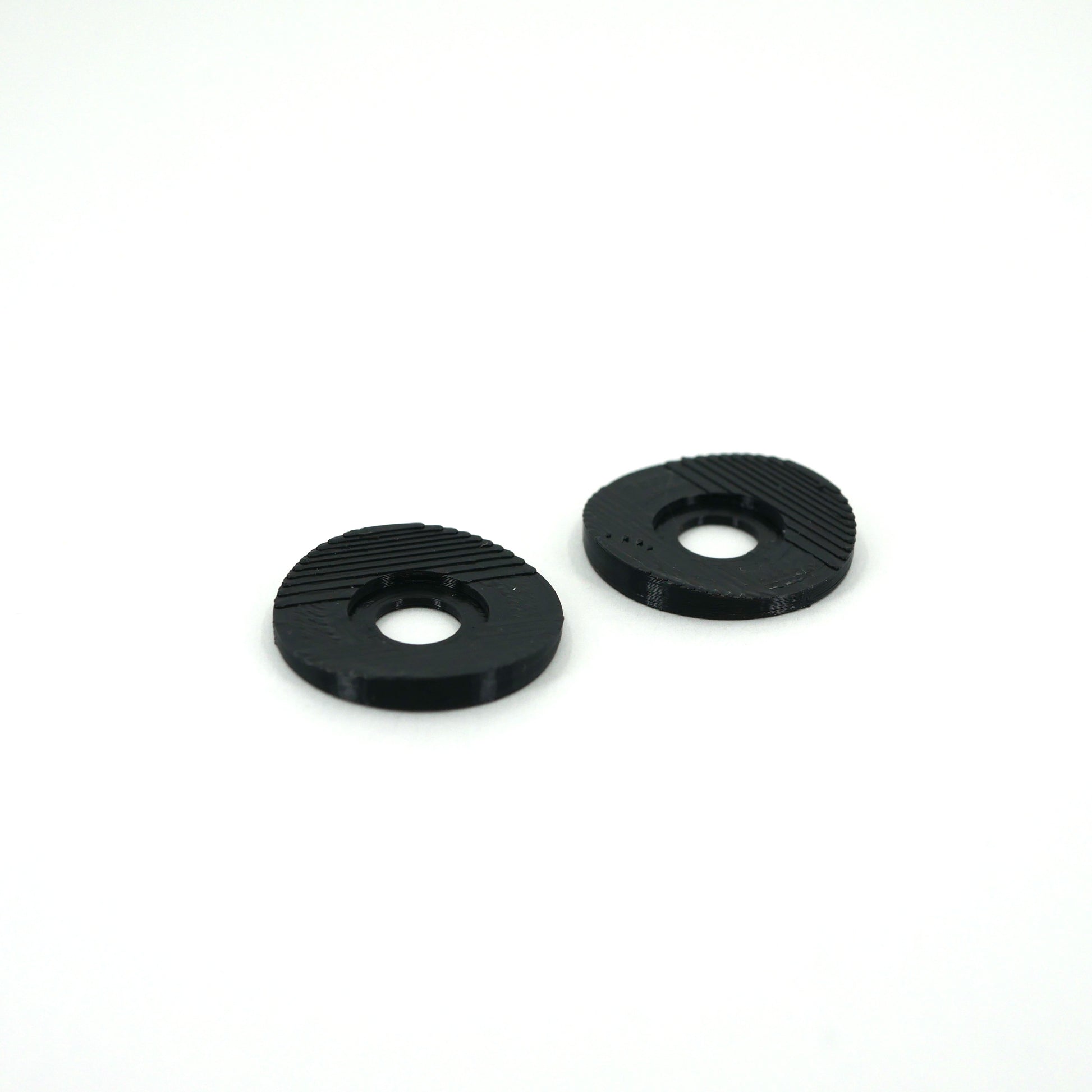 Two black microphone washers for the Blue Yeti microphone.