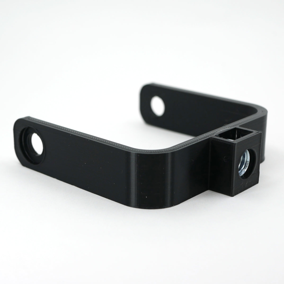 The left side of a black microphone mount for the Blue Yeti X microphone.