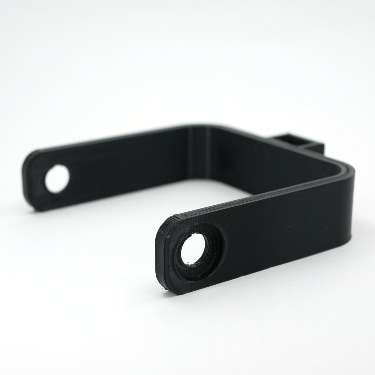 A black microphone mount for the Blue Yeti X microphone.
