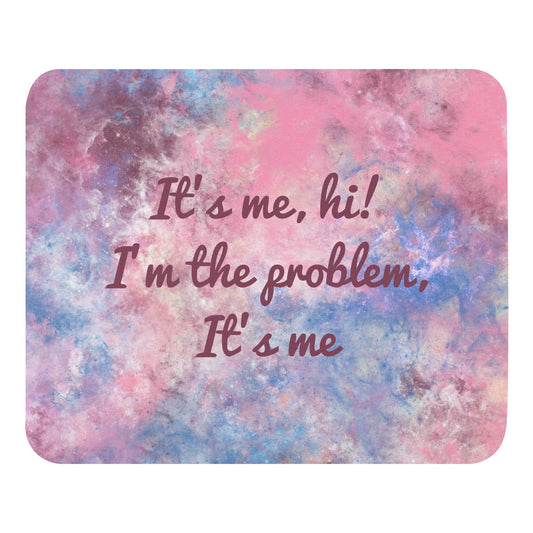 A blue, pink, and white mouse pad with the quote It's me, hi! I'm the problem, it's me.