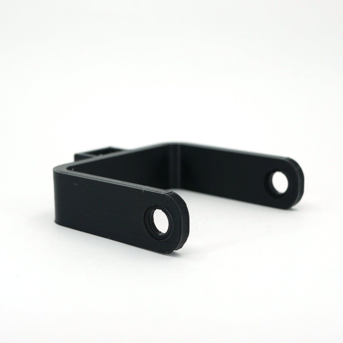 A black microphone mount for the FIFINE K678 microphone sitting at an angle.