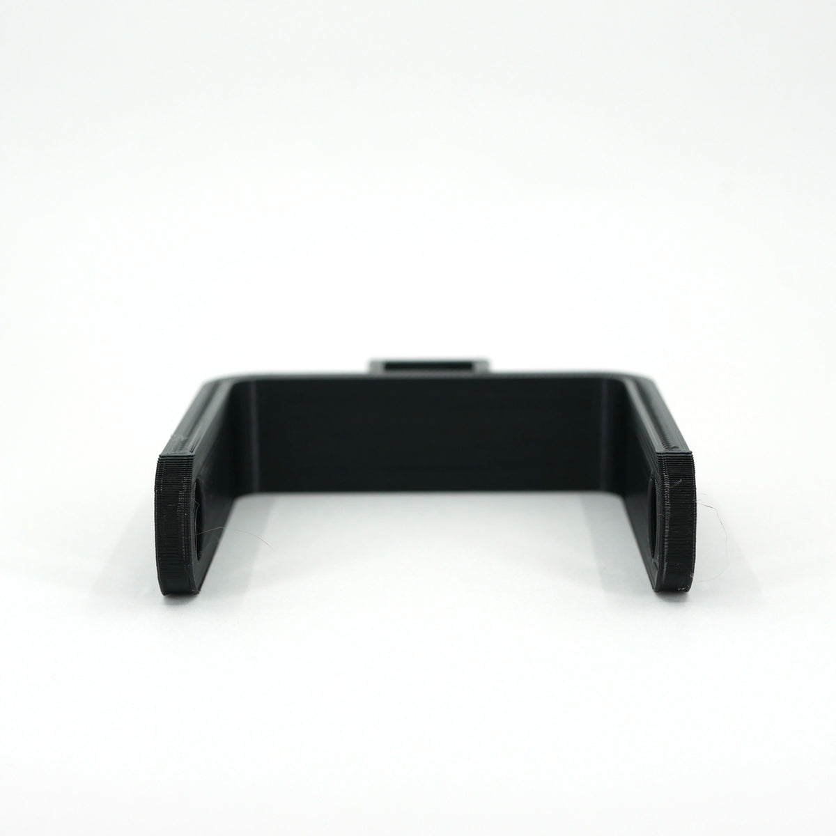 The front of a black microphone mount for the FIFINE K678 microphone.