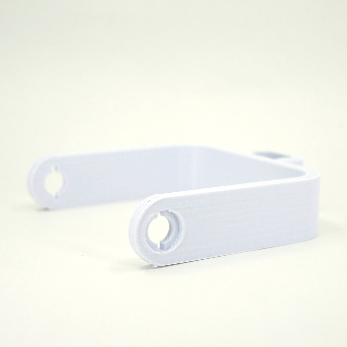 A white microphone mount for the FIFINE K690 microphone.