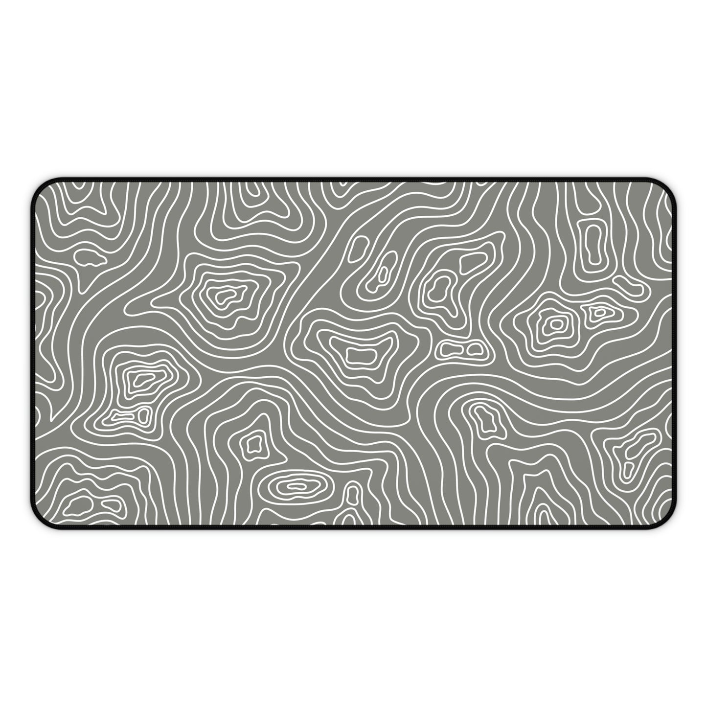 A 12" x 22" gray desk mat with white topographic lines.