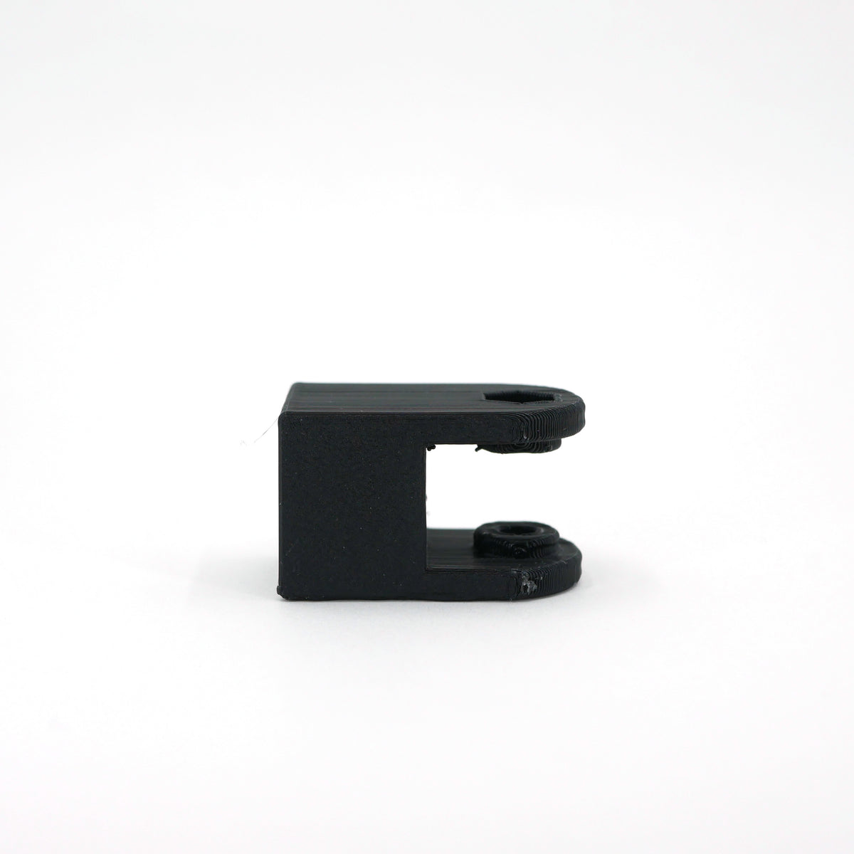 The back of a black HyperX SoloCast microphone mount adapter.