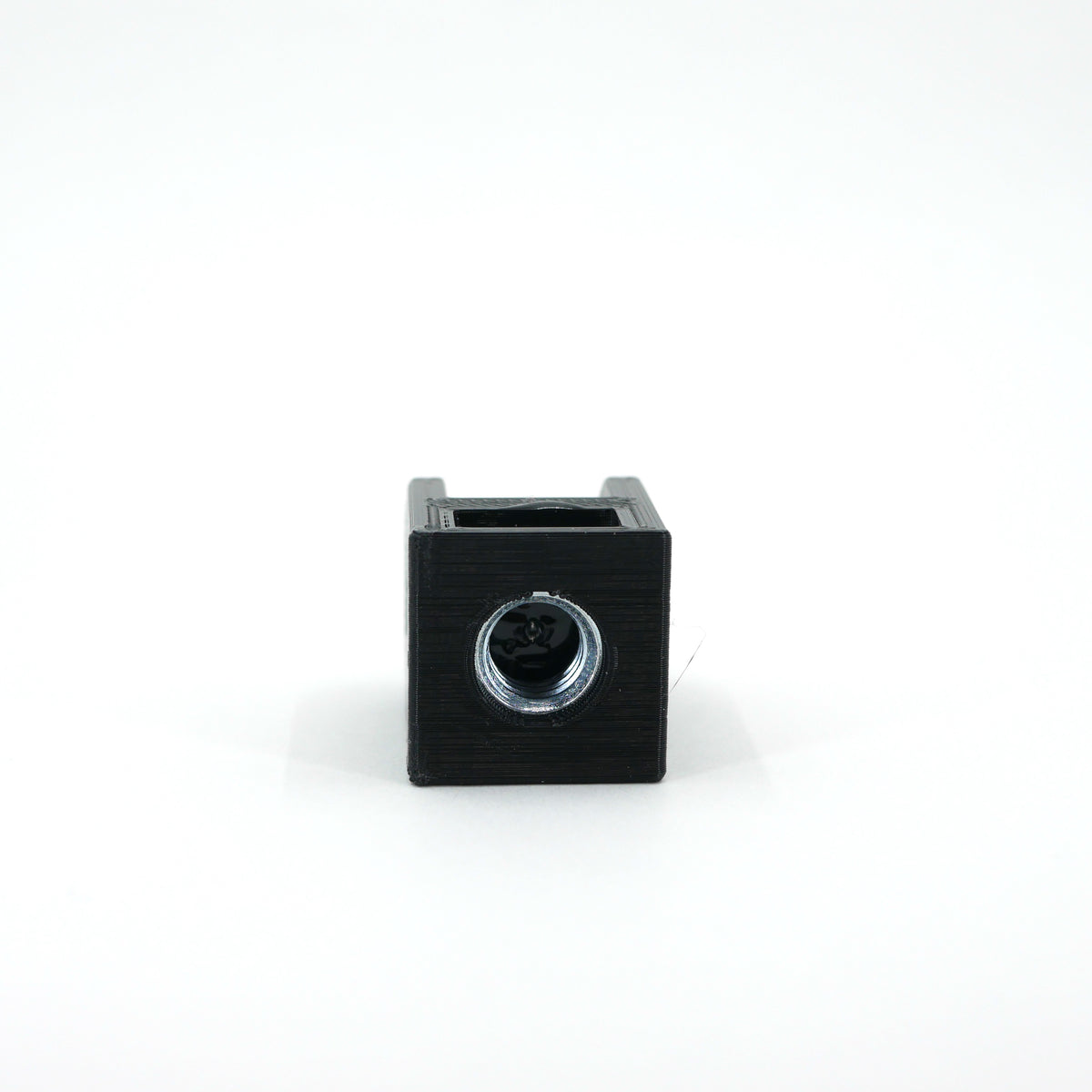 The bottom of a black HyperX SoloCast microphone mount adapter.