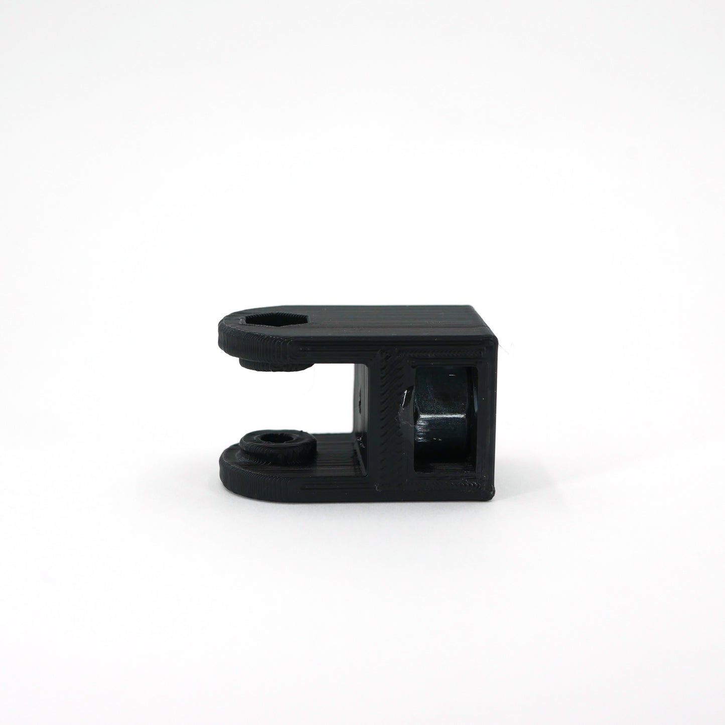 The front of a black HyperX SoloCast microphone mount adapter.
