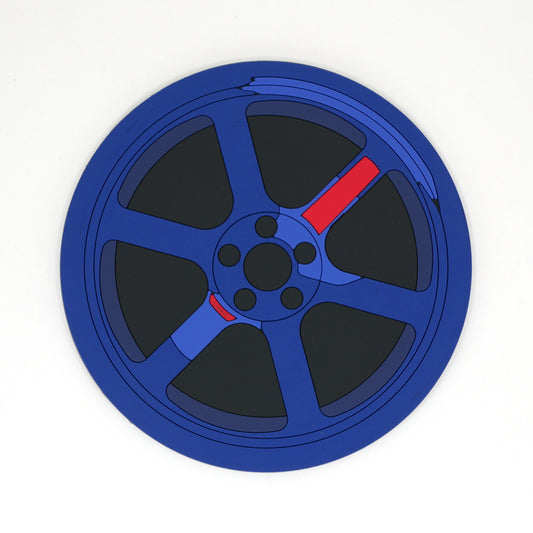 A blue TE wheel PVC rubber coaster.