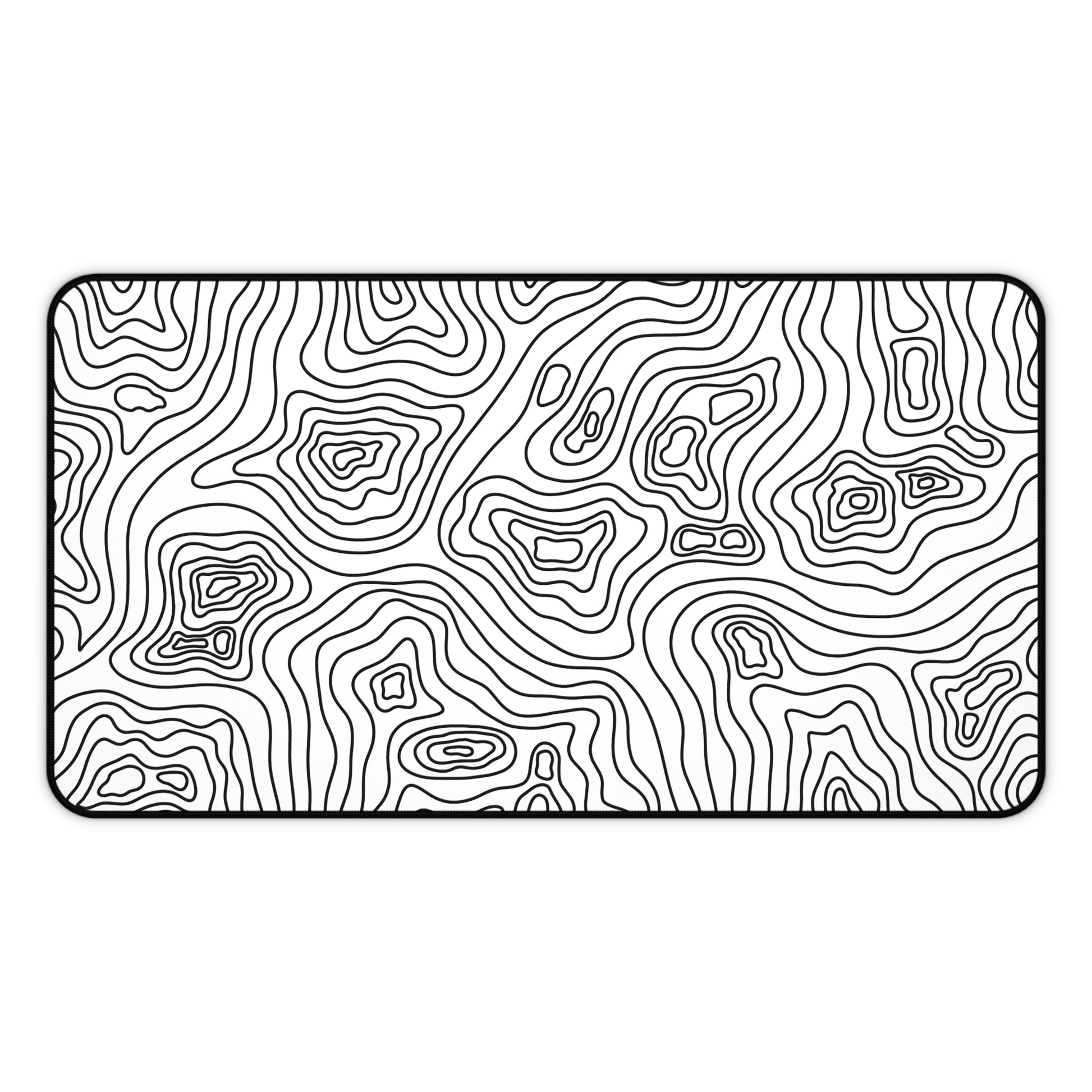 A 12" x 22" white desk mat with black topographic lines.