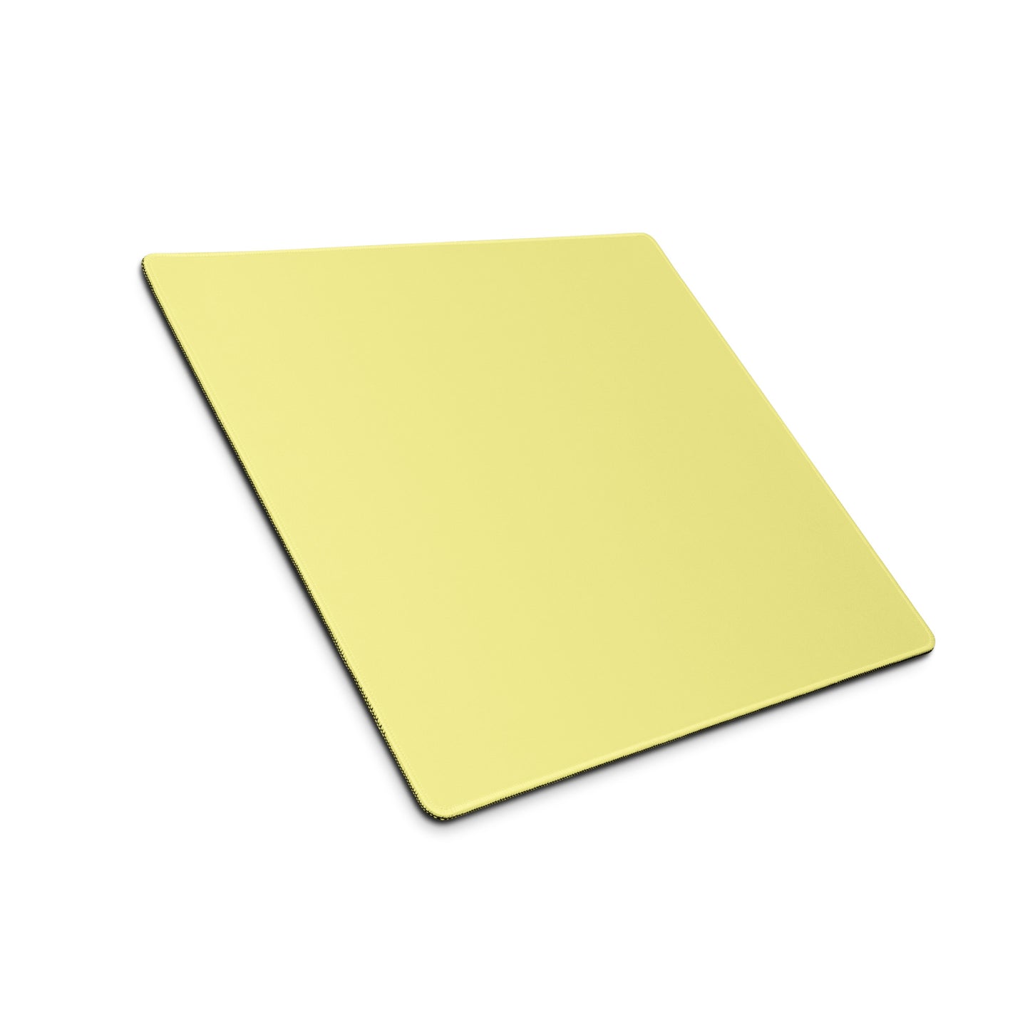 An 18" x 16" yellow gaming desk pad sitting at an angle.