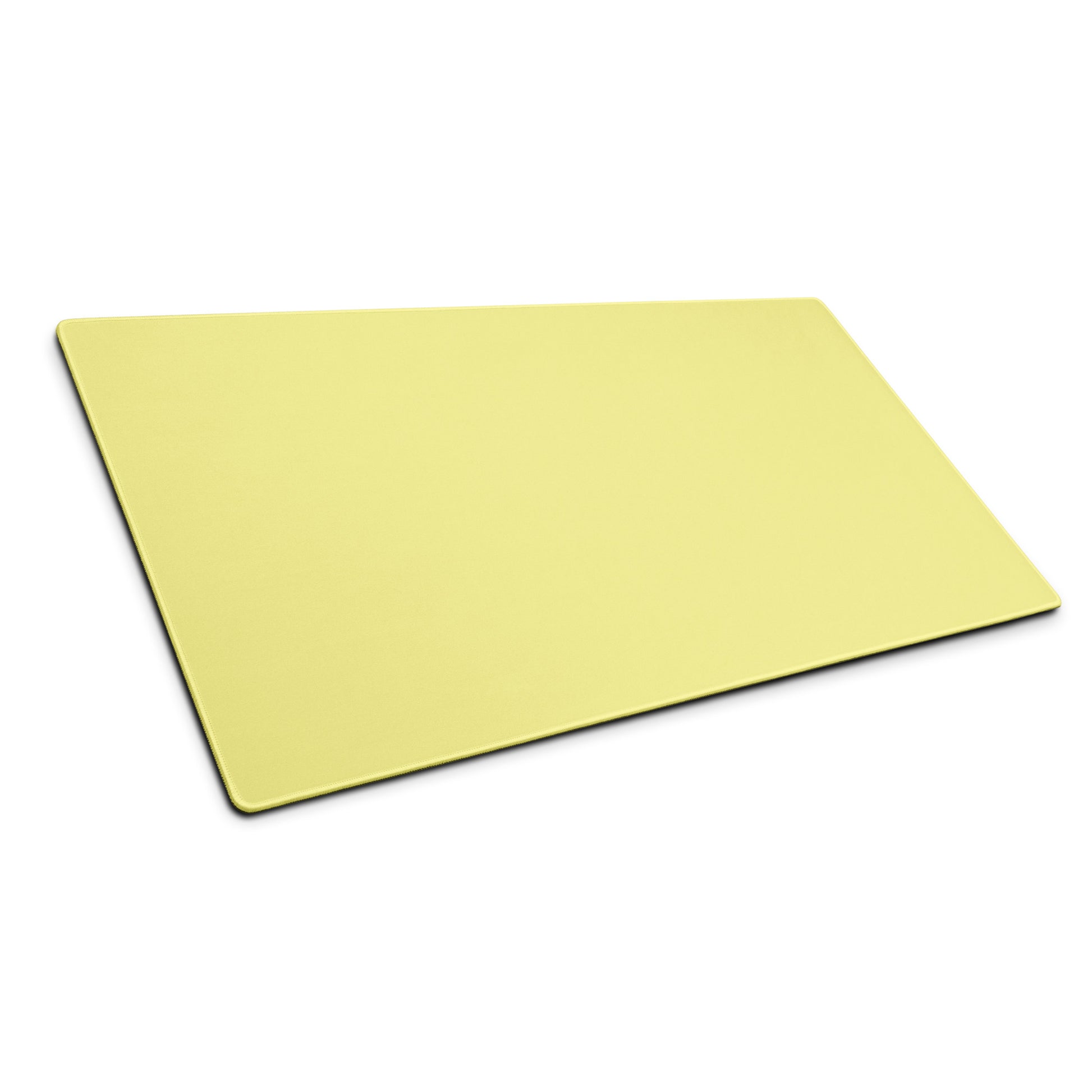 A 36" x 18" yellow gaming desk pad sitting at an angle.